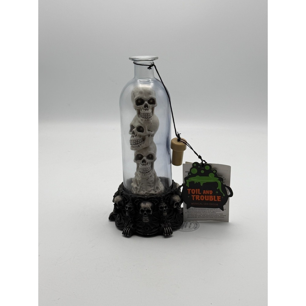 Toil and Trouble Halloween Stacked Skulls Bottle LED Musical Decor Figurine